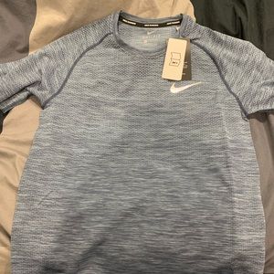 Nike running shirt.